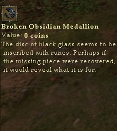 Brokenobsidianmedallion.jpg